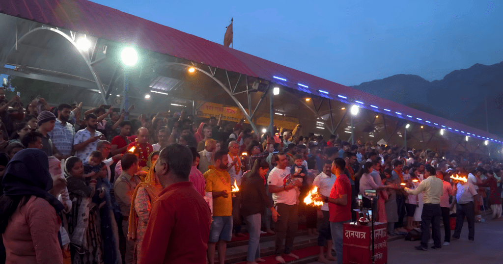 taking blessing after aarti at triveni ghat